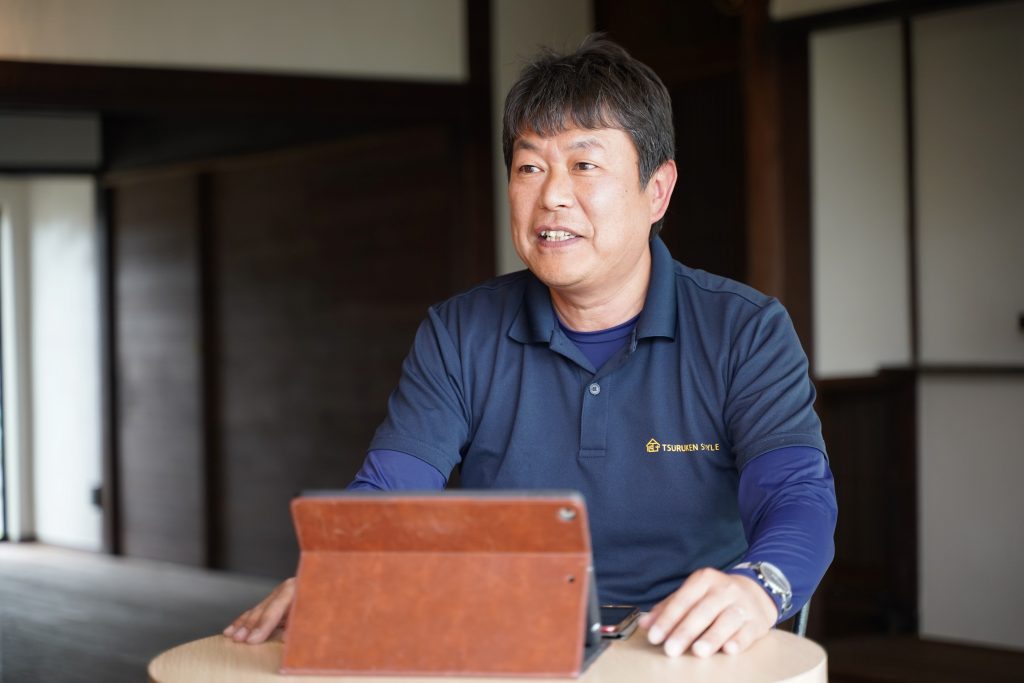 江上 賢一